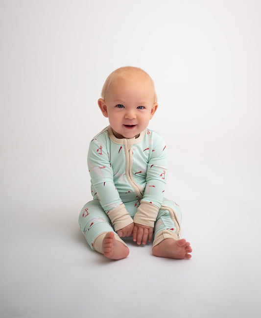 Infant ready to start baby-led weaning wearing Coasty's Ibis bamboo pajamas