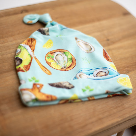baby top knot hat with oyster print