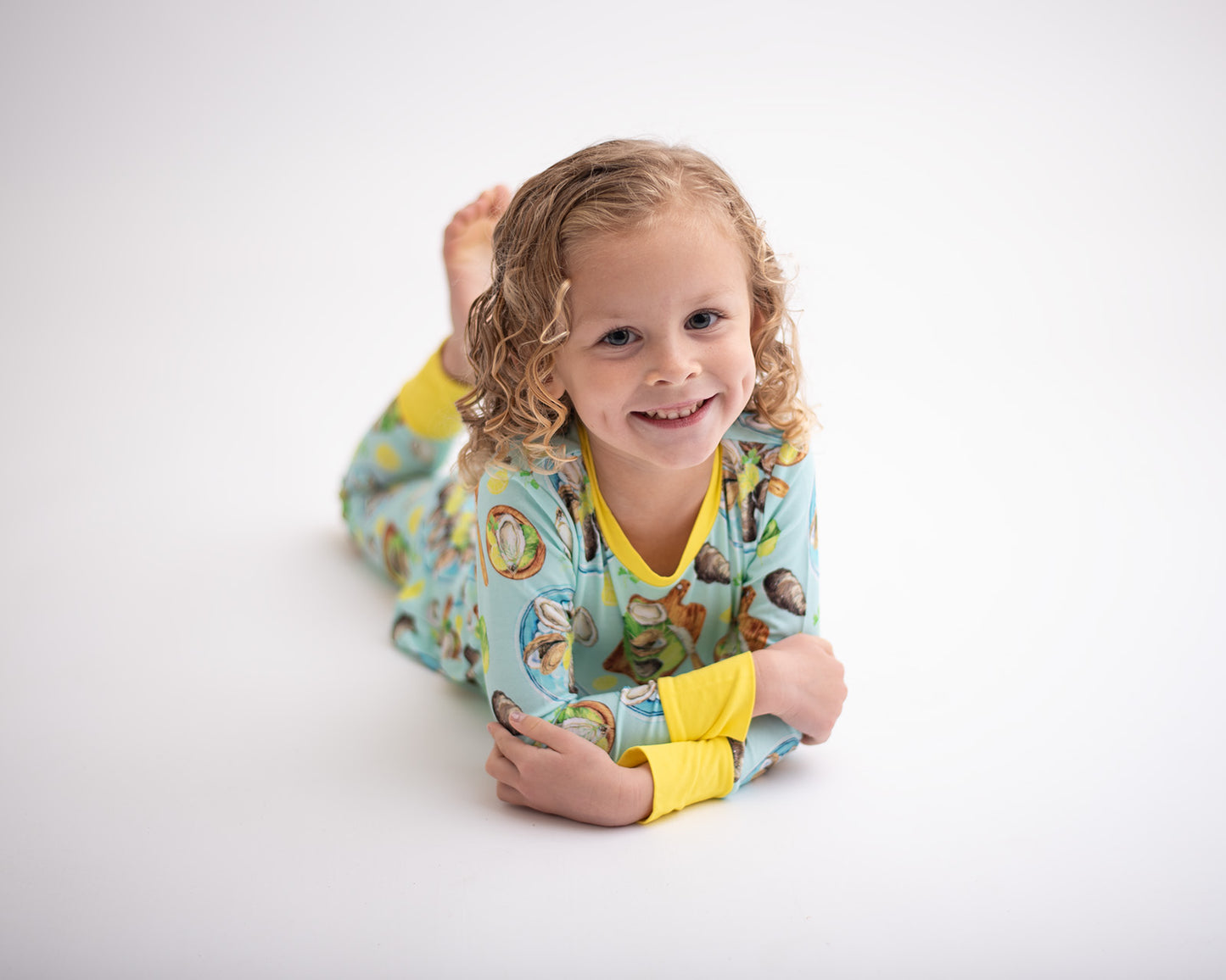 girl wearing oyster pajama set